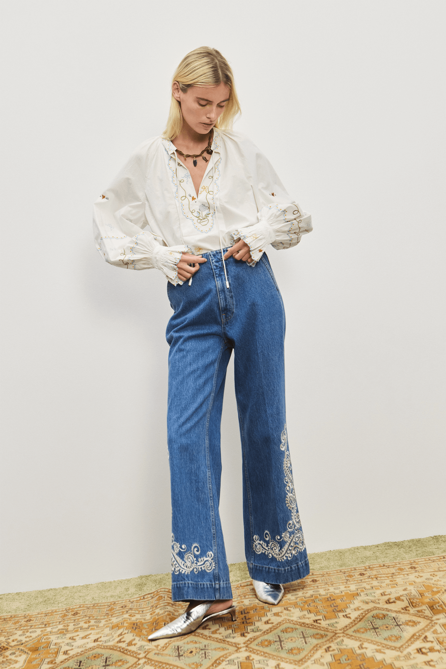 ALÉMAIS JACONES FLARE DENIM JEAN IN INDIGO | THE NEW TREND