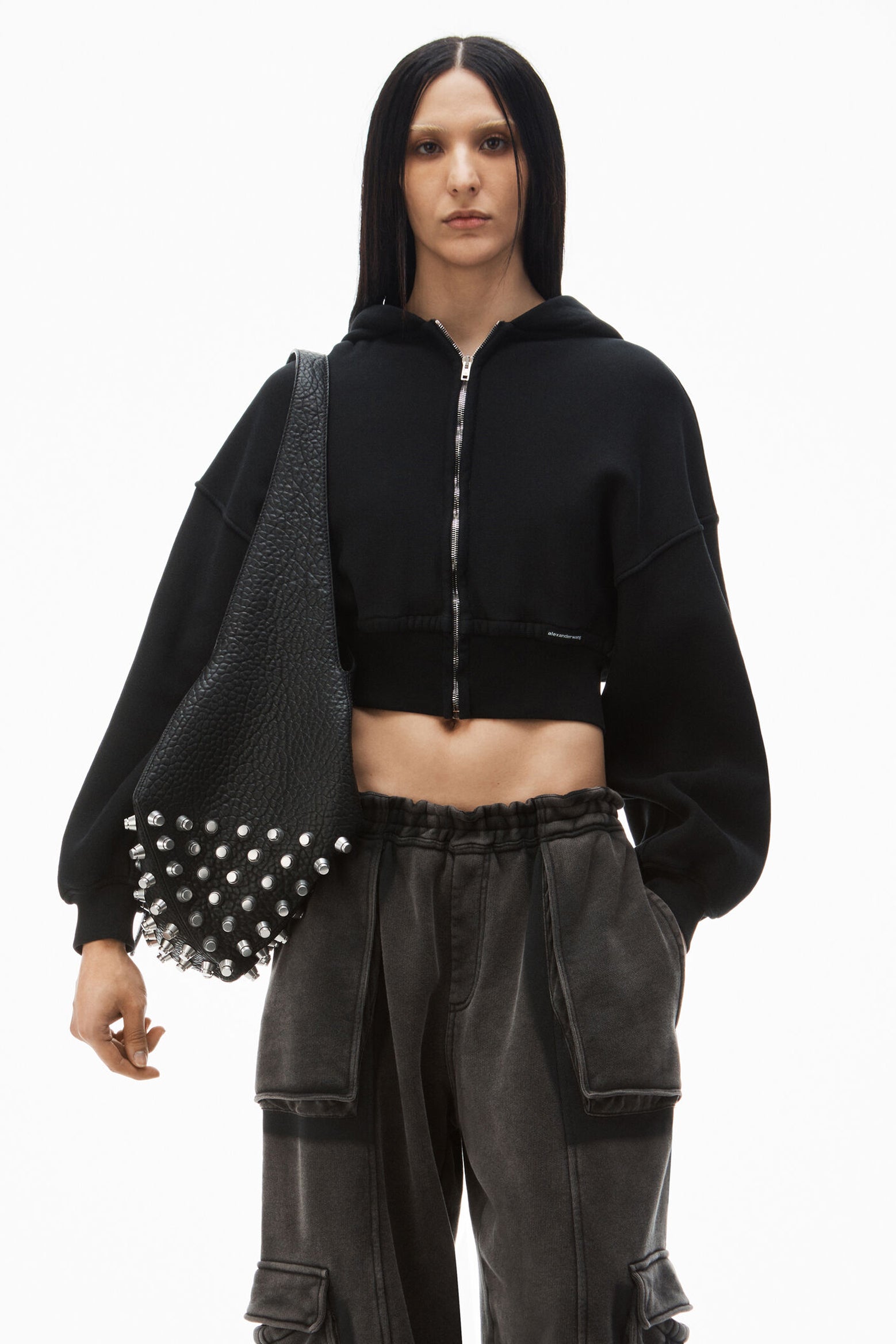 The Alexander Wang Cropped Zip Hoodie With Branded Seam Label in Faded Black available at The New Trend Australia