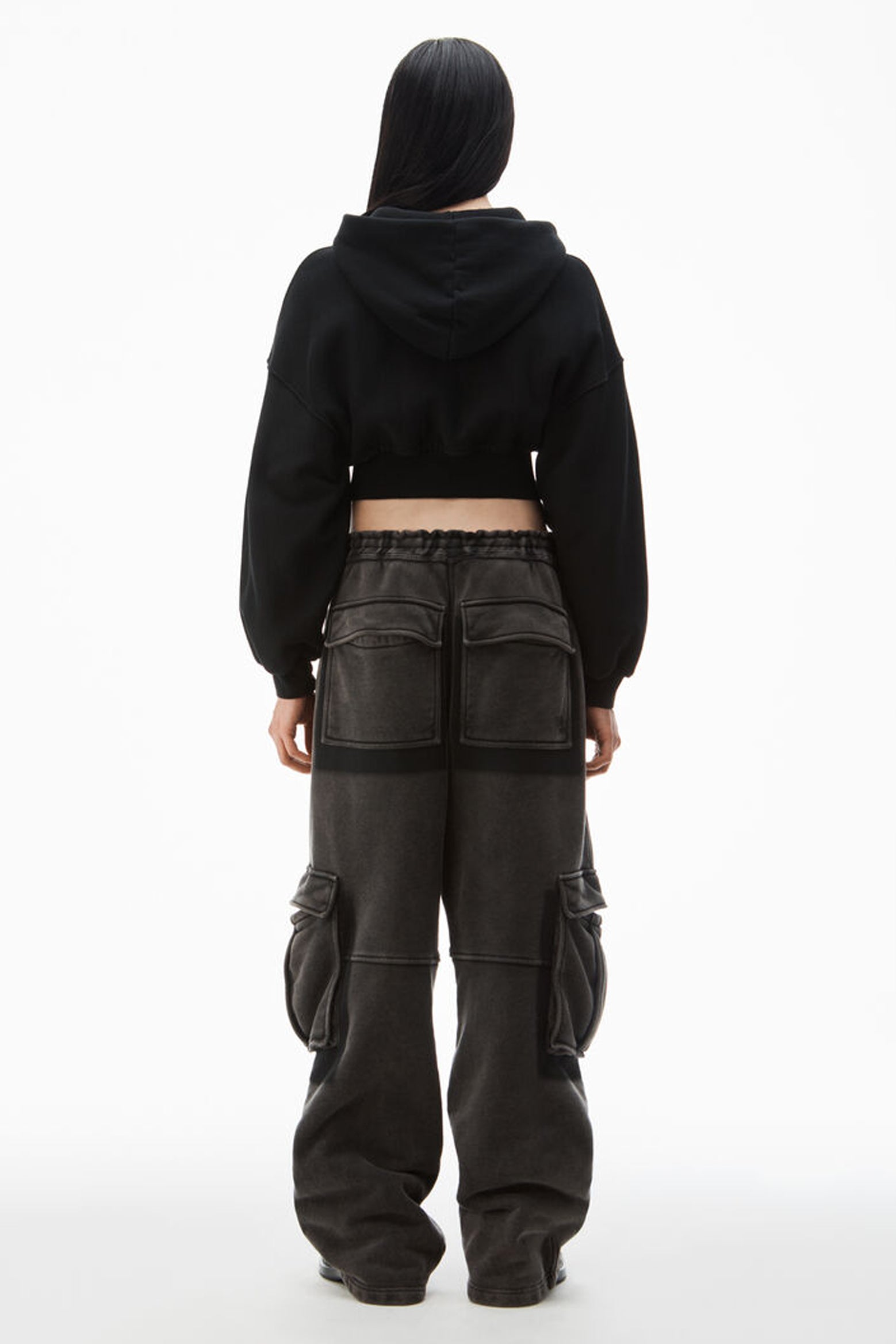 The Alexander Wang Cropped Zip Hoodie With Branded Seam Label in Faded Black available at The New Trend Australia