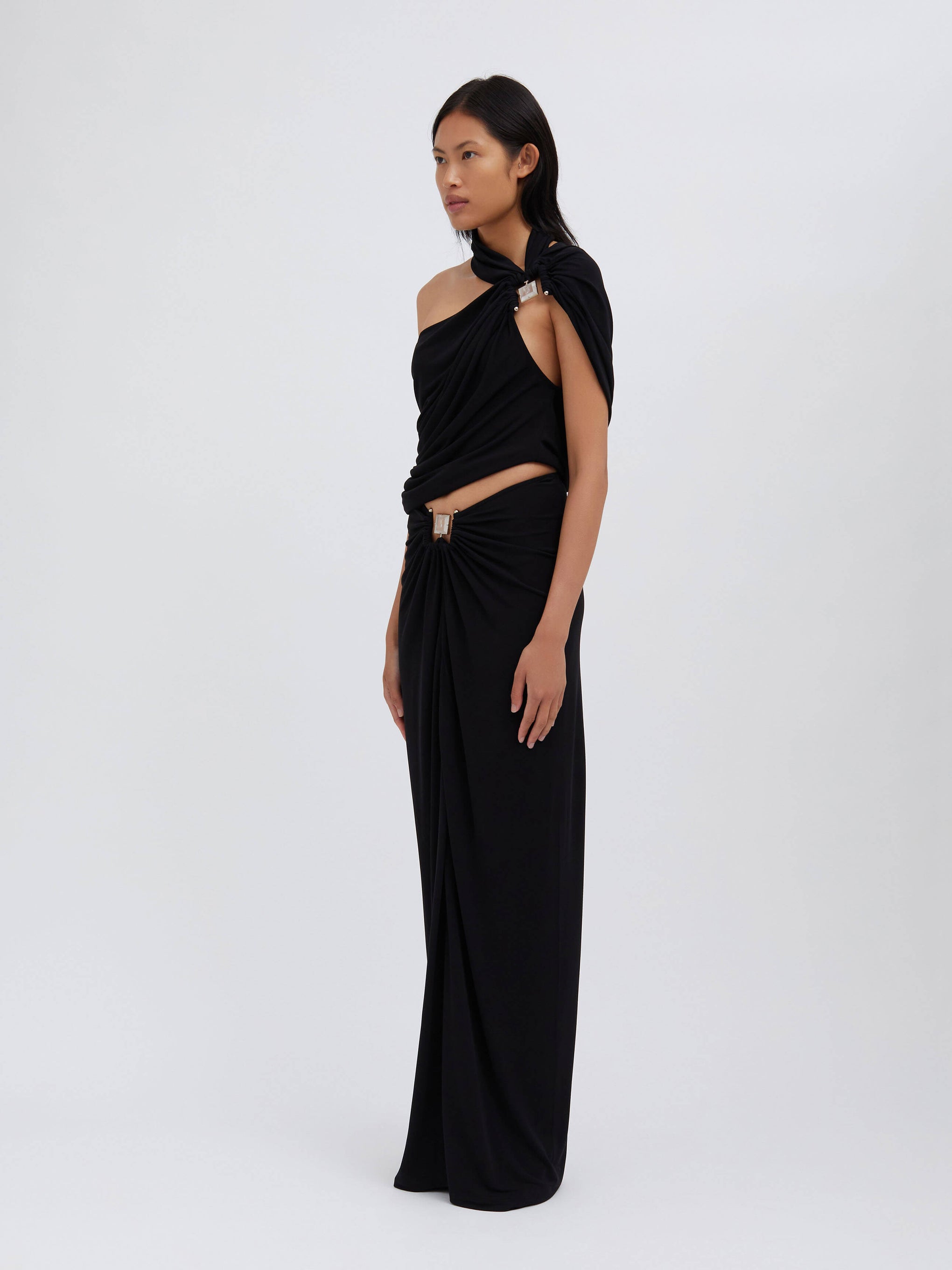 The Christopher Esber Bezel Quartz Halter Top in black is available at The New Trend
