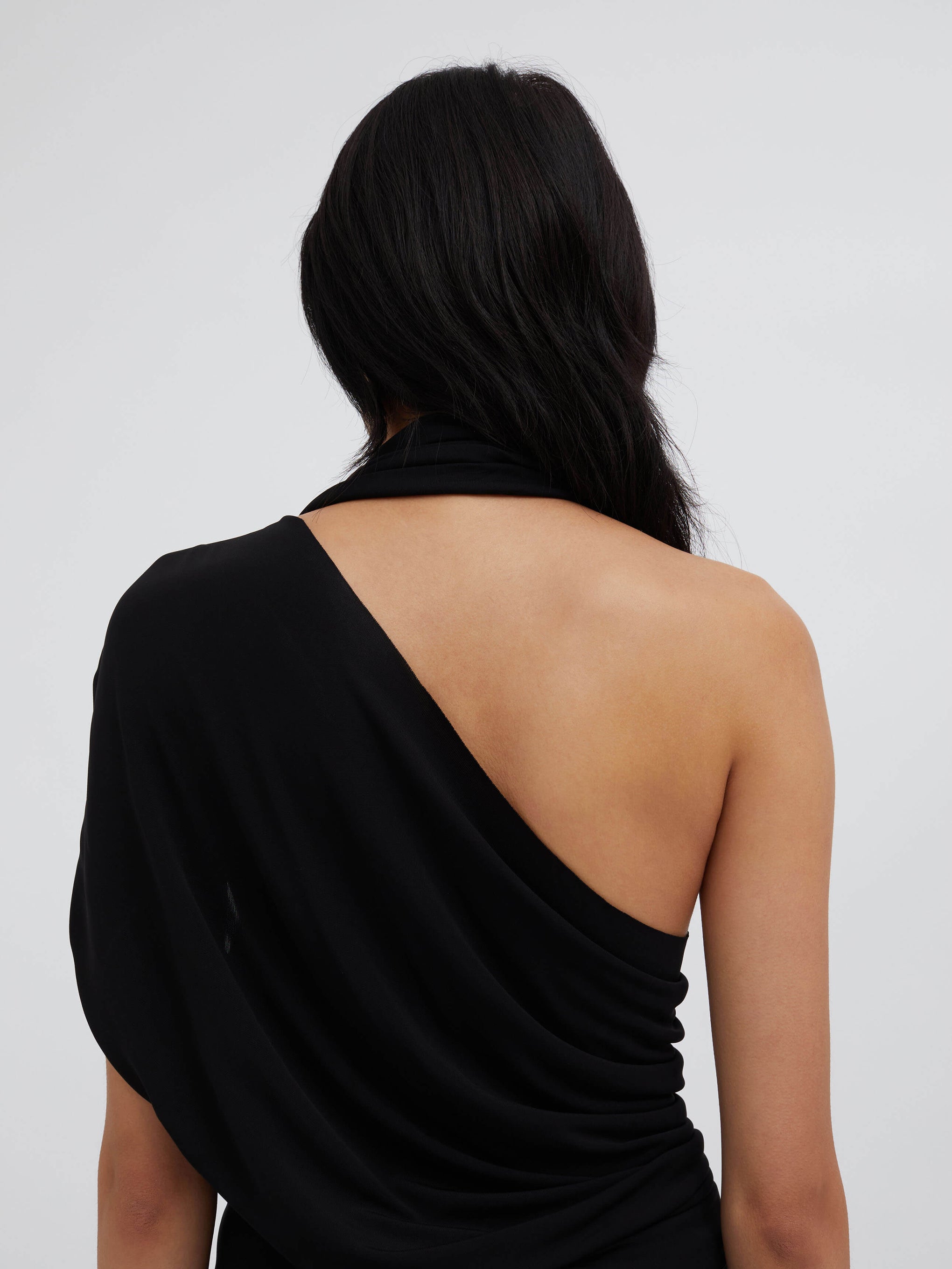 The Christopher Esber Bezel Quartz Halter Top in black is available at The New Trend