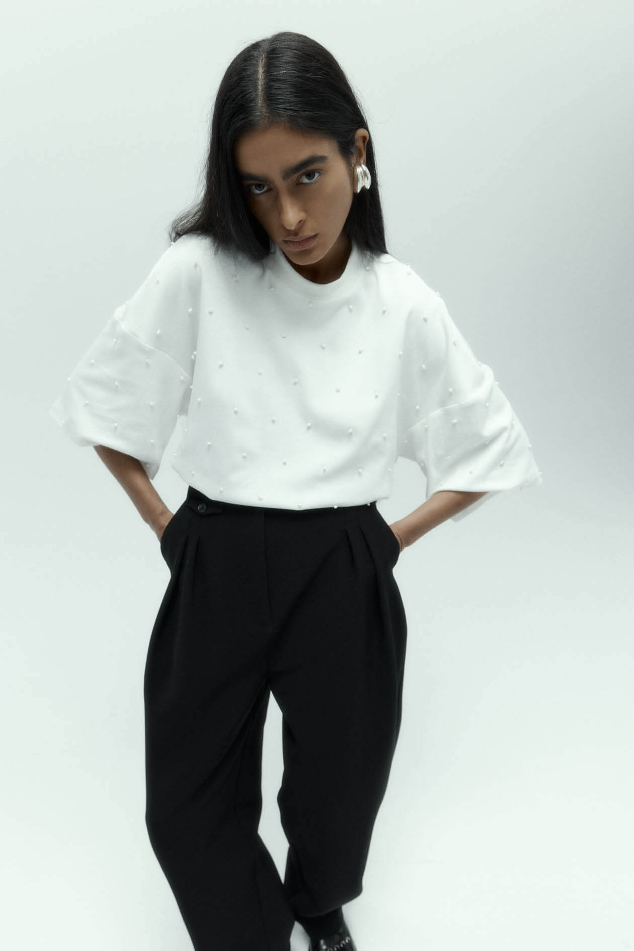 The Beaded Gibson Tee in Pearl by Harris Tapper is available at The New Trend