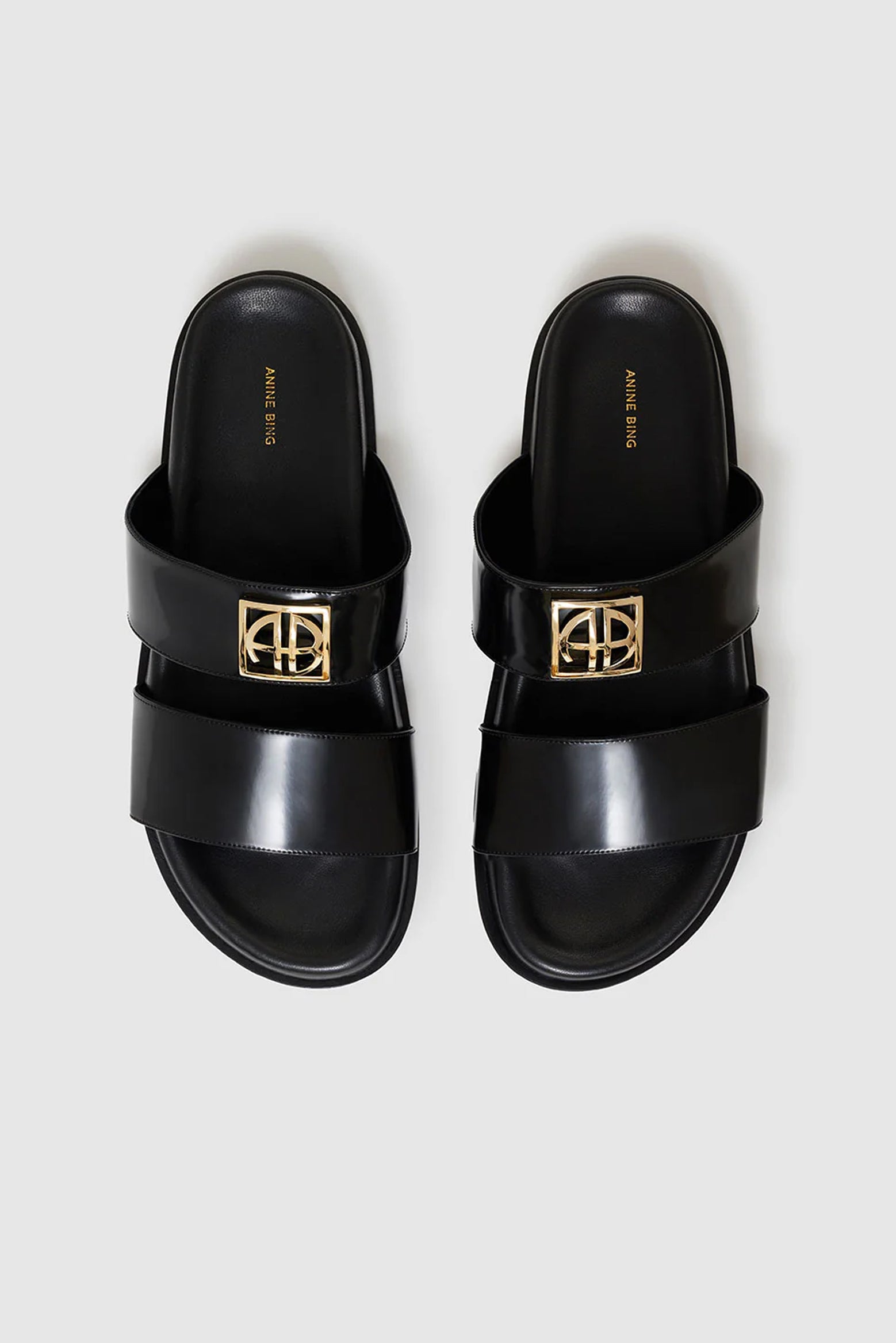 The Anine Bing Parker Slides Monogram in Black available at The New Trend Australia