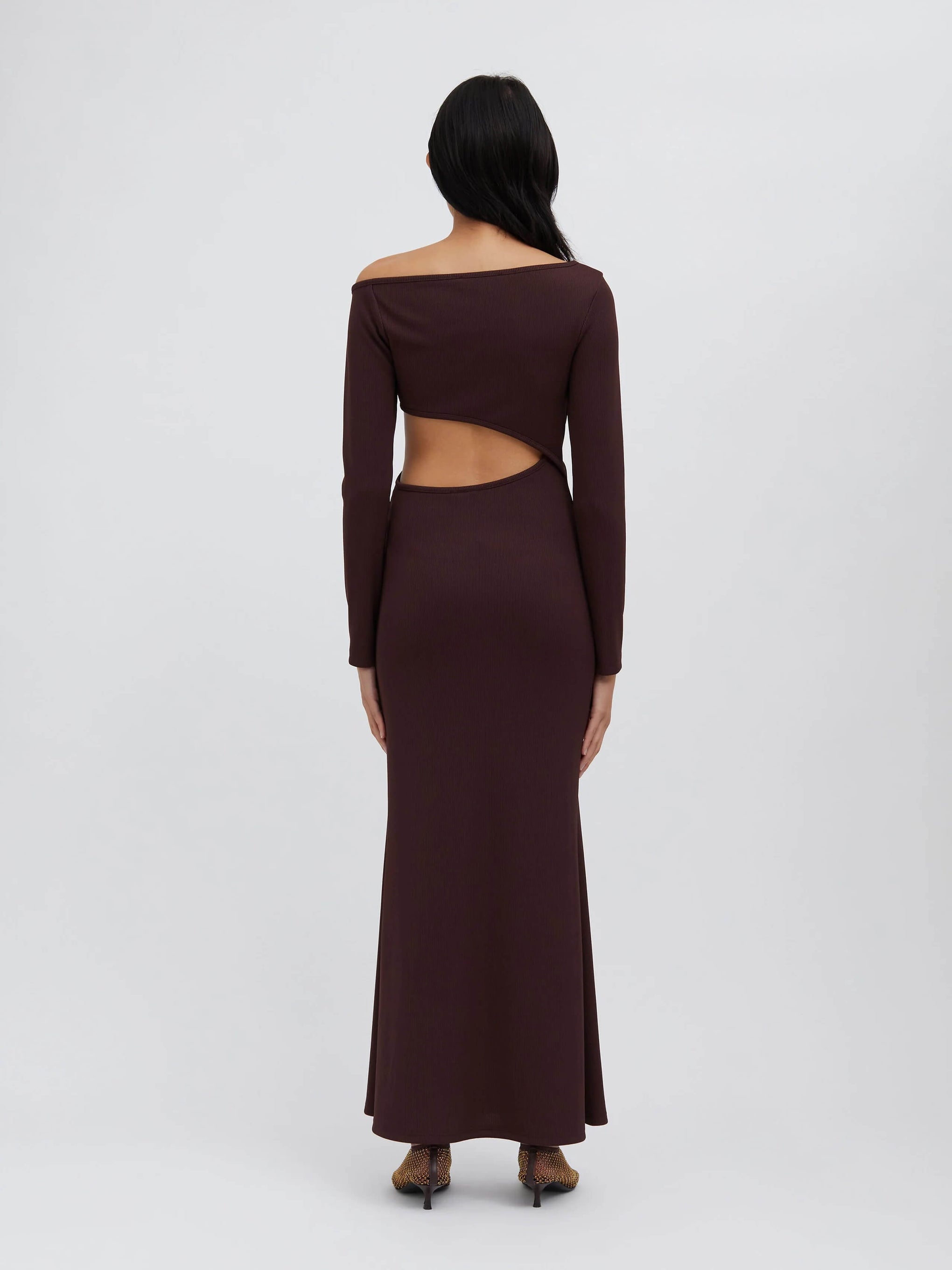 The Christopher Esber Spiral Crystal Dress in mahogany is available at The New Trend