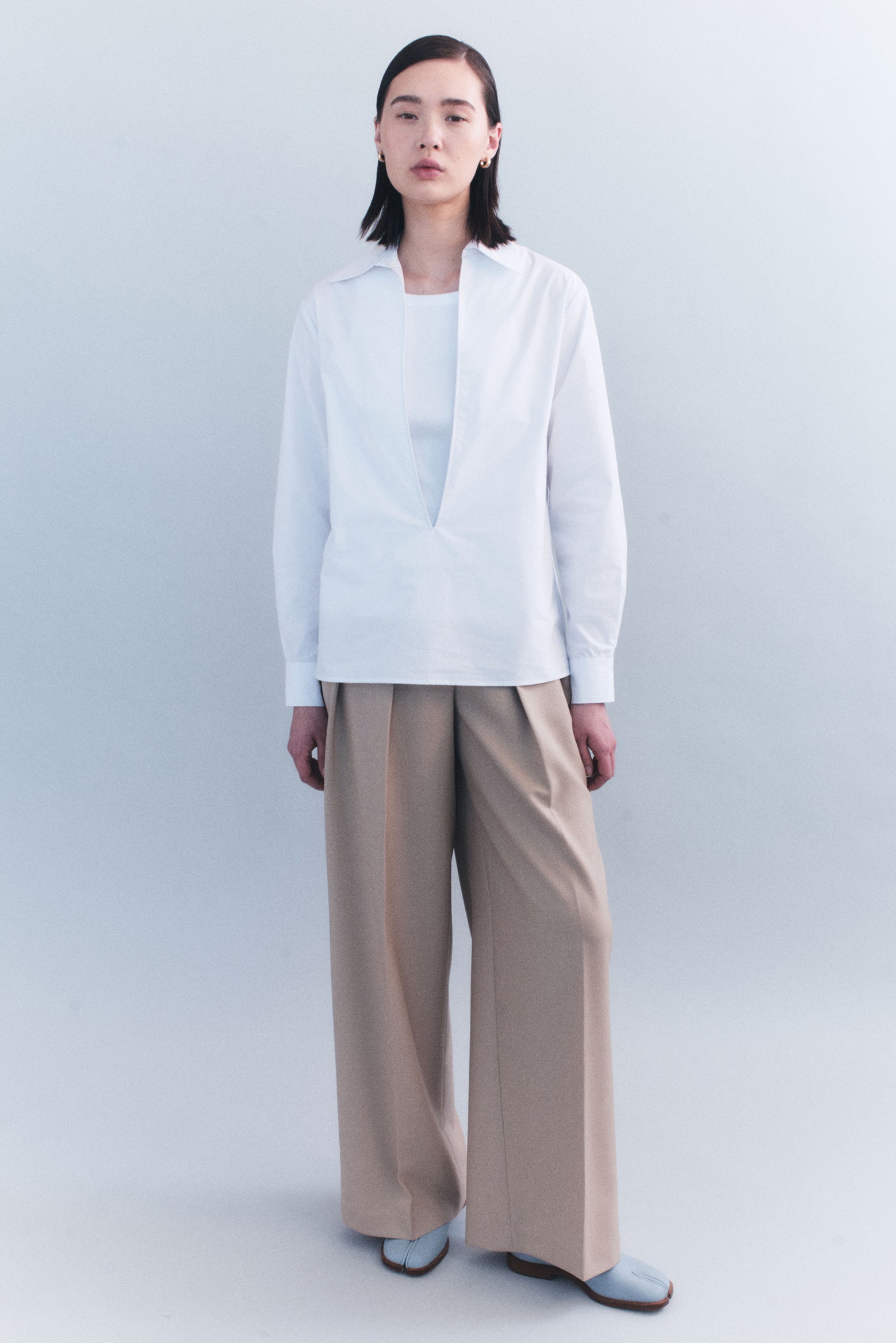 The Courtney Zheng Haines Poplin Front Slit Shirt in White available at The New Trend Australia