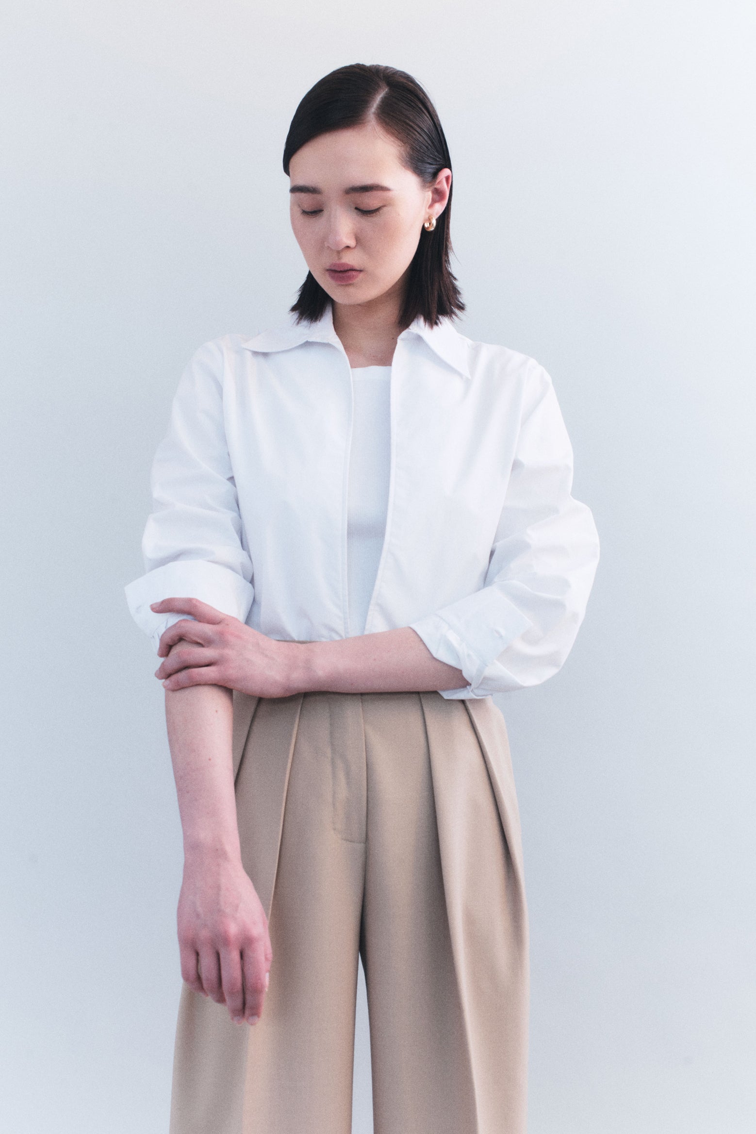 The Courtney Zheng Haines Poplin Front Slit Shirt in White available at The New Trend Australia