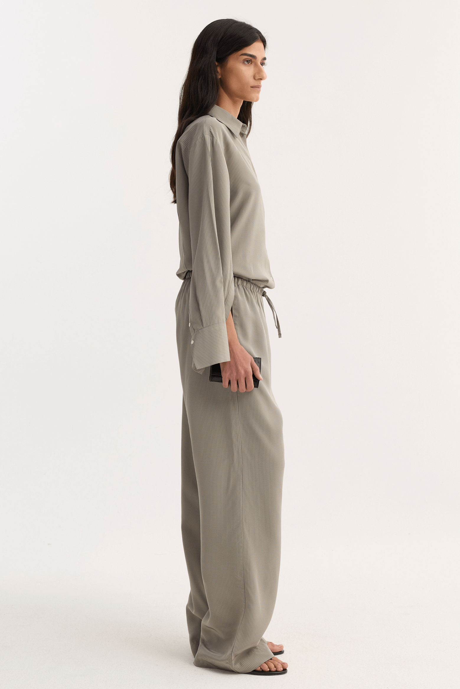 RÓHE RELAXED FLUID STRIPE TROUSERS LIGHT GREY | THE NEW TREND