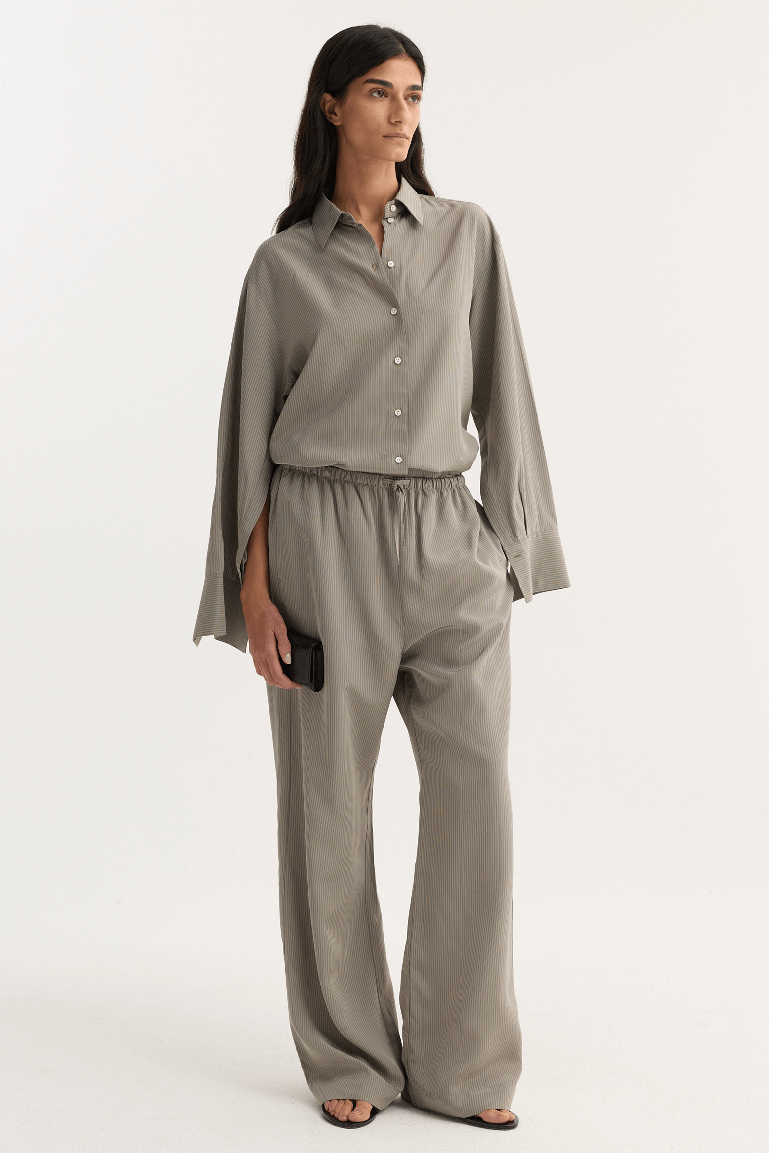 RÓHE RELAXED FLUID STRIPE TROUSERS LIGHT GREY | THE NEW TREND