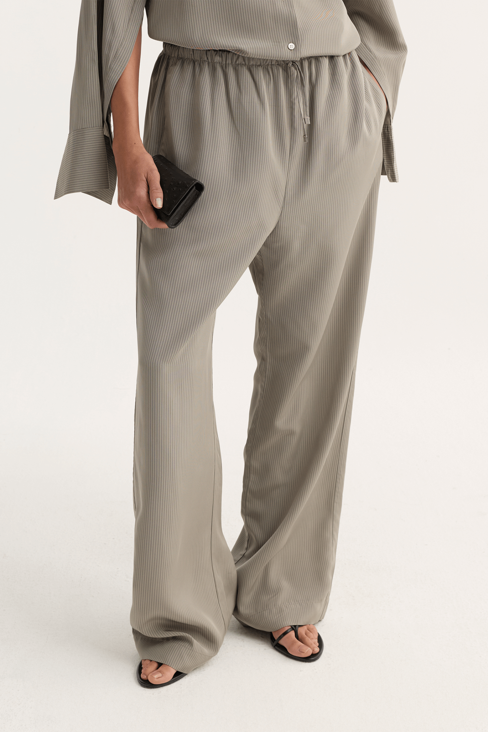 RÓHE RELAXED FLUID STRIPE TROUSERS LIGHT GREY | THE NEW TREND