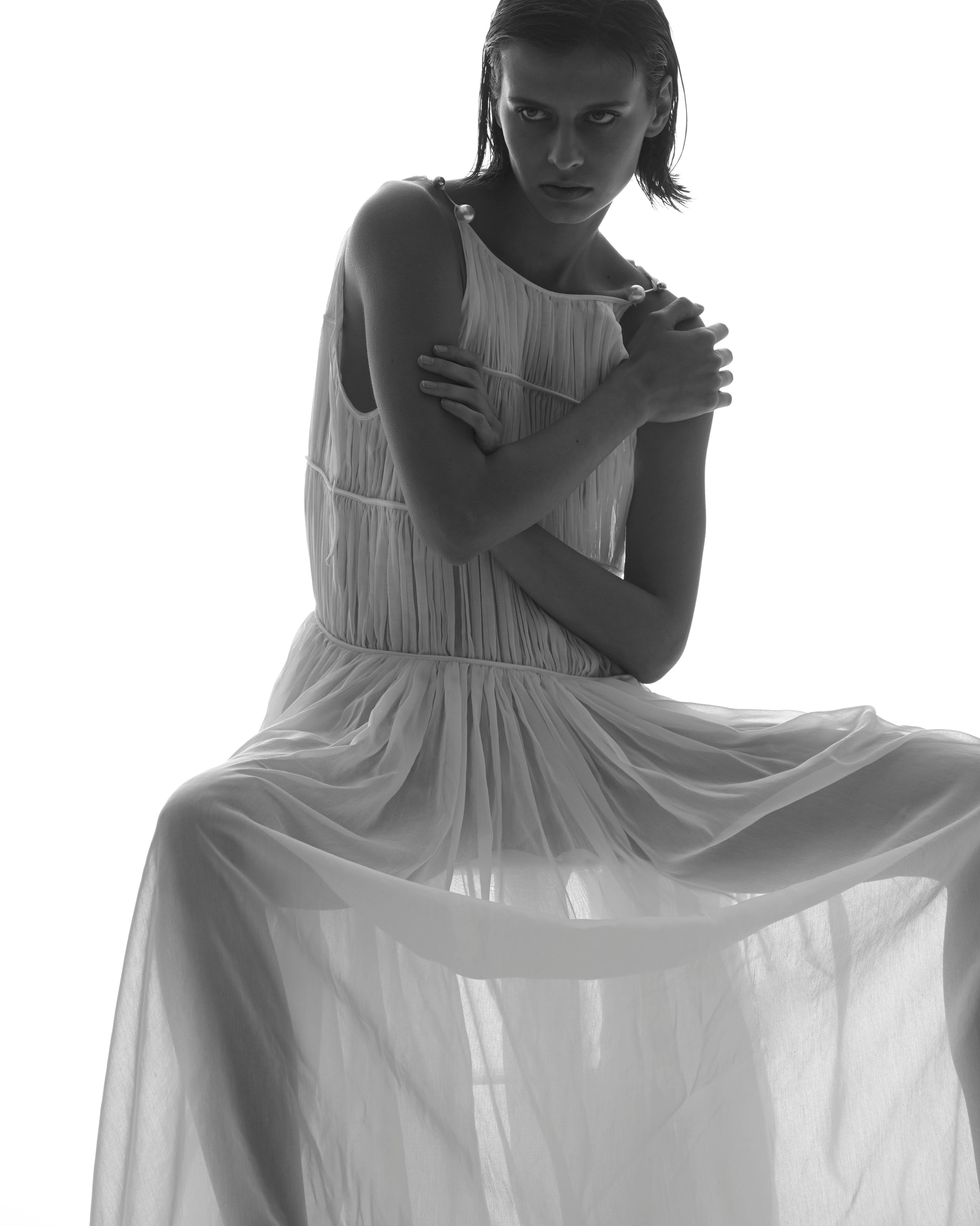 The Morgan Dress by More Noir in Pearl Blue is available at The New Trend