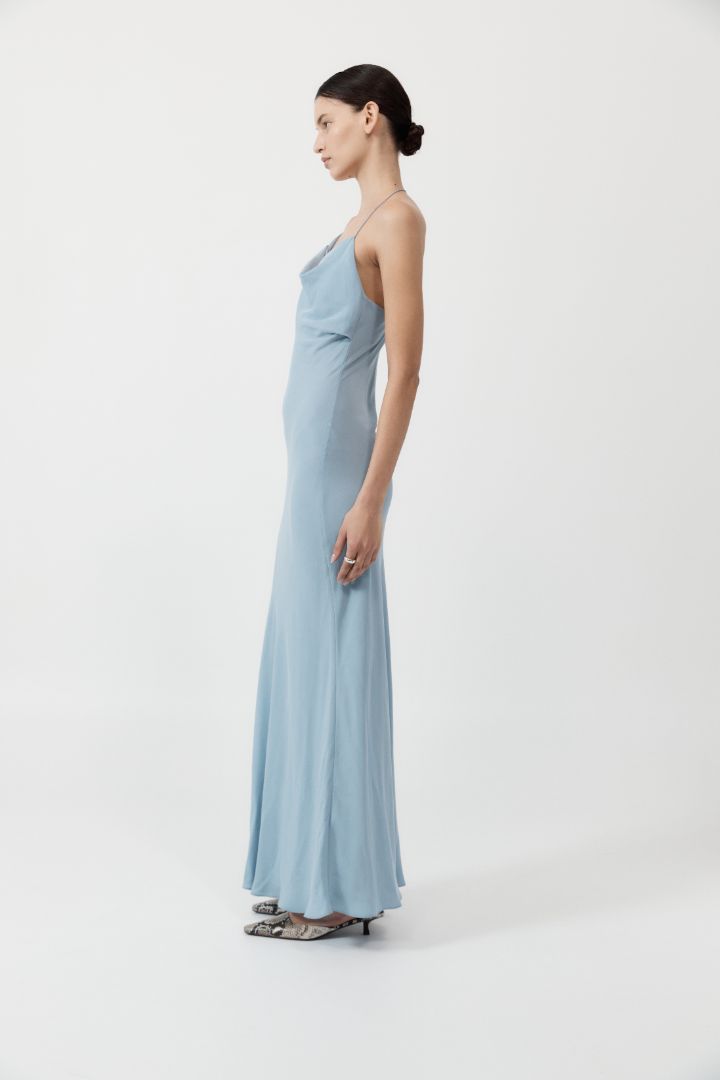 The ST. AGNI Asymmetrical Drape Dress in Stone Blue from The New Trend.