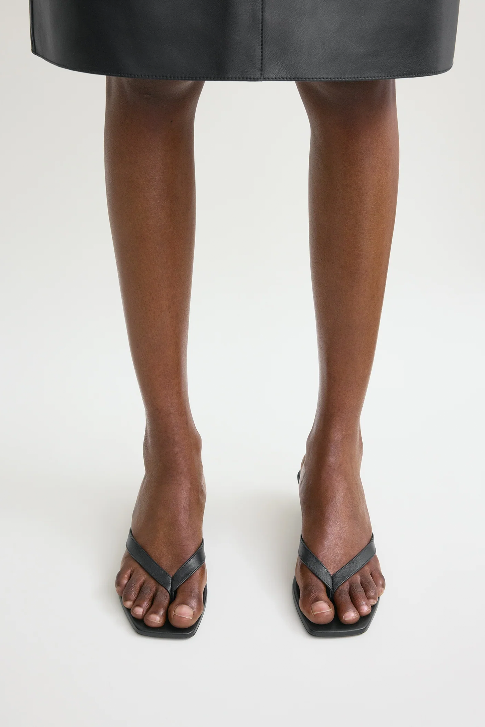 TOTEME LEATHER HEELED FLIP FLOPS IN BLACK | THE NEW TREND