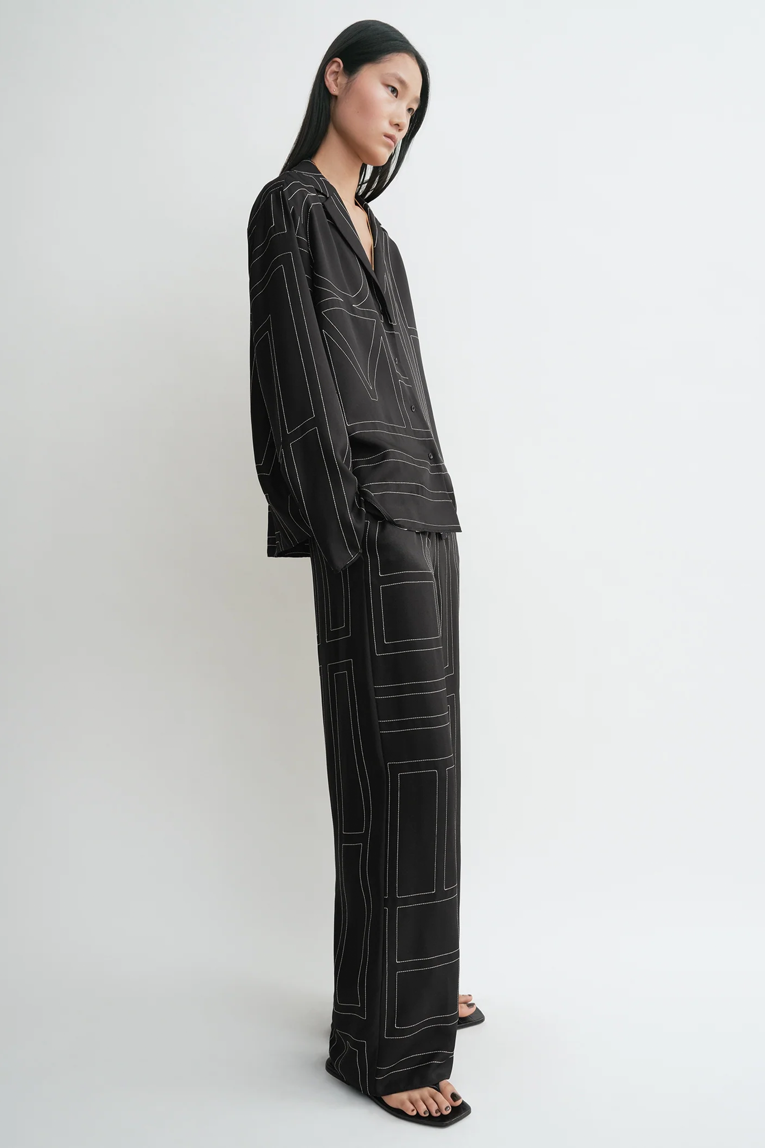 TOTEME MONOGRAM SILK PJ TOP IN BLACK | THE NEW TREND