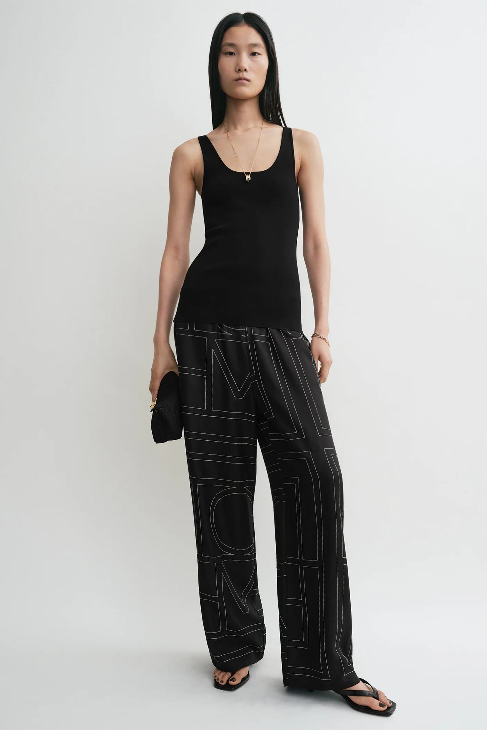 TOTEME MONOGRAM SILK PJ BOTTOMS IN BLACK | THE NEW TREND