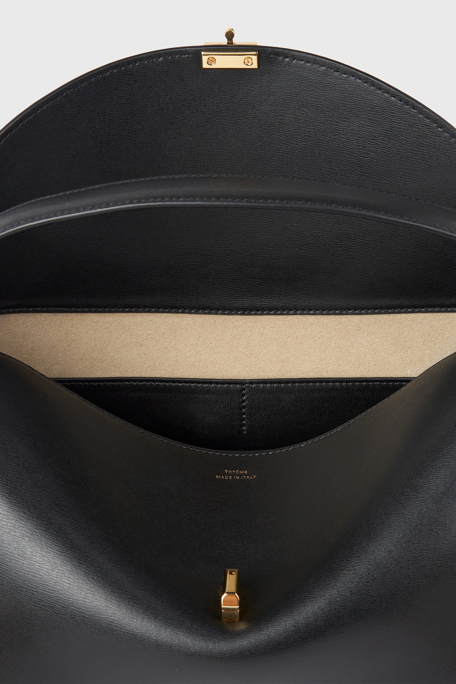 TOTEME T-LOCK LEATHER TOP HANDLE IN BLACK | THE NEW TREND