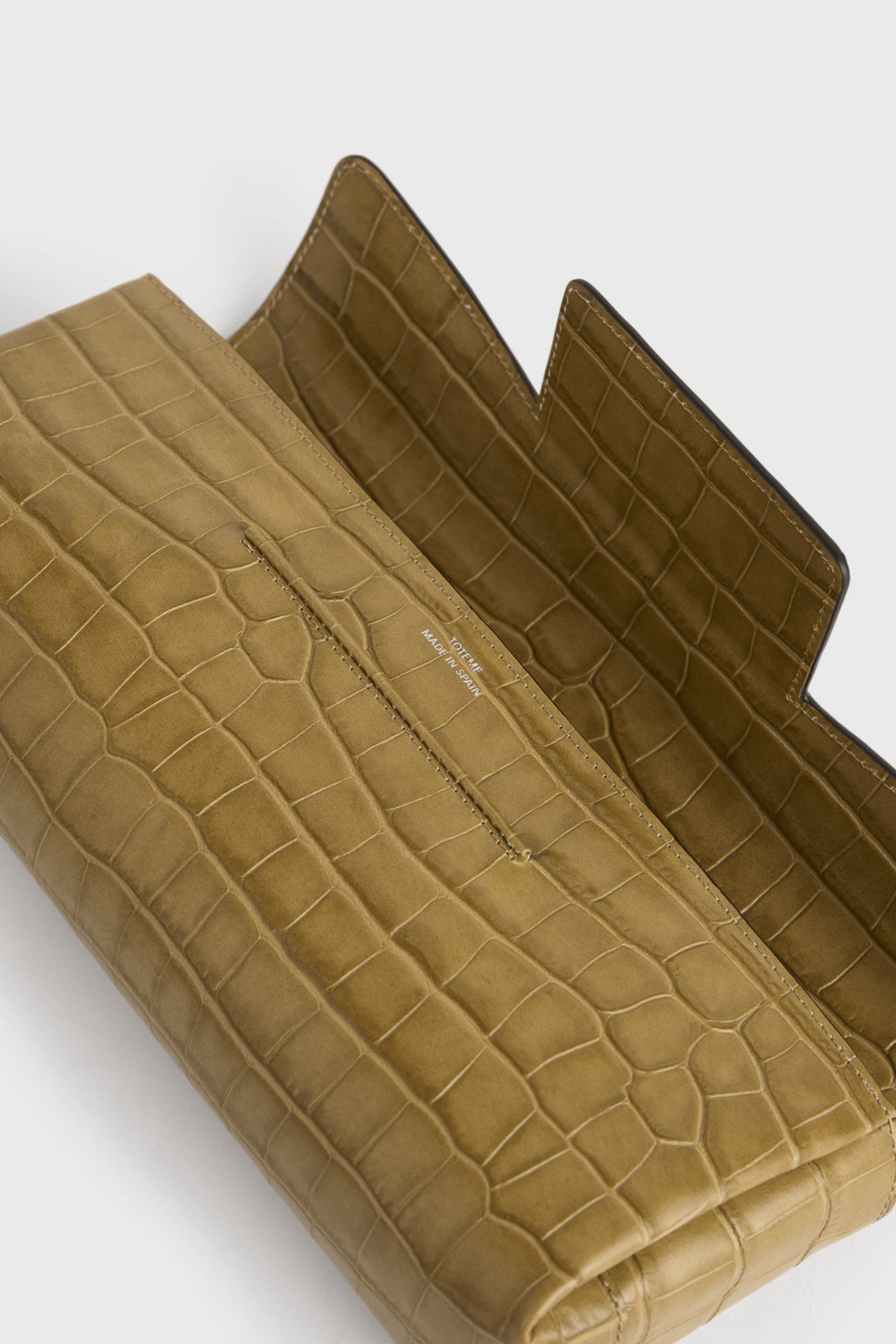 TOTEME SOFT CROCO-EMBOSSED T-CLUTCH | THE NEW TREND