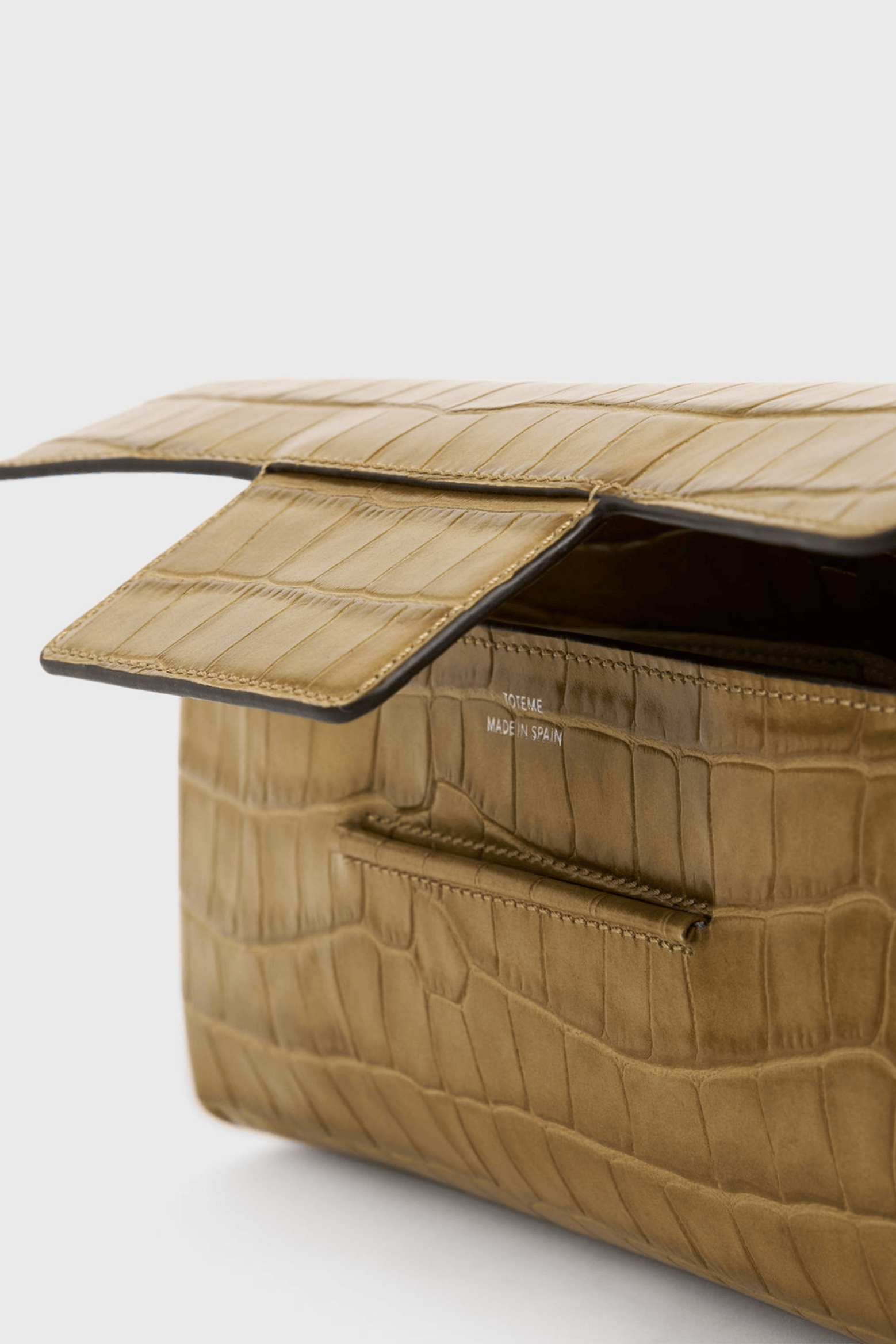 TOTEME SOFT CROCO-EMBOSSED T-CLUTCH | THE NEW TREND