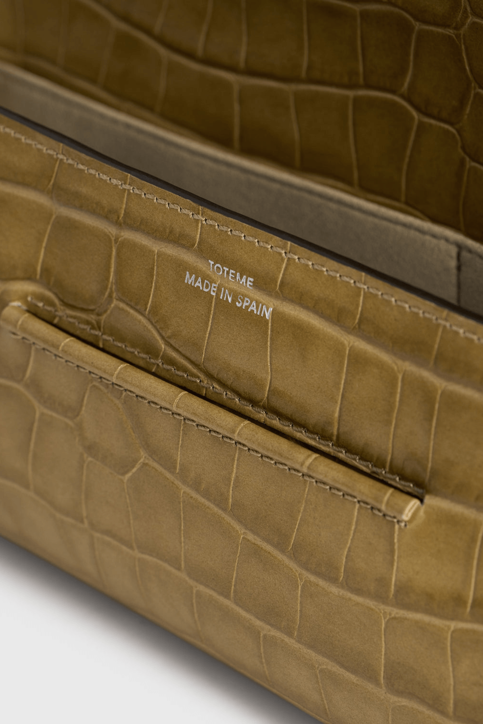 TOTEME SOFT CROCO-EMBOSSED T-CLUTCH | THE NEW TREND