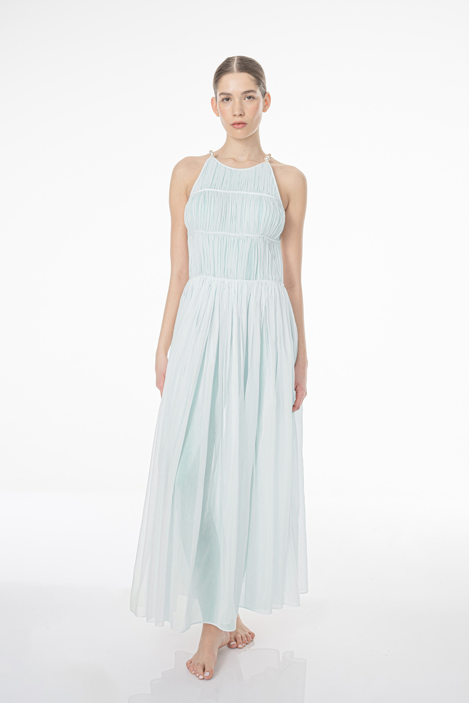 The Morgan Dress by More Noir in Pearl Blue is available at The New Trend