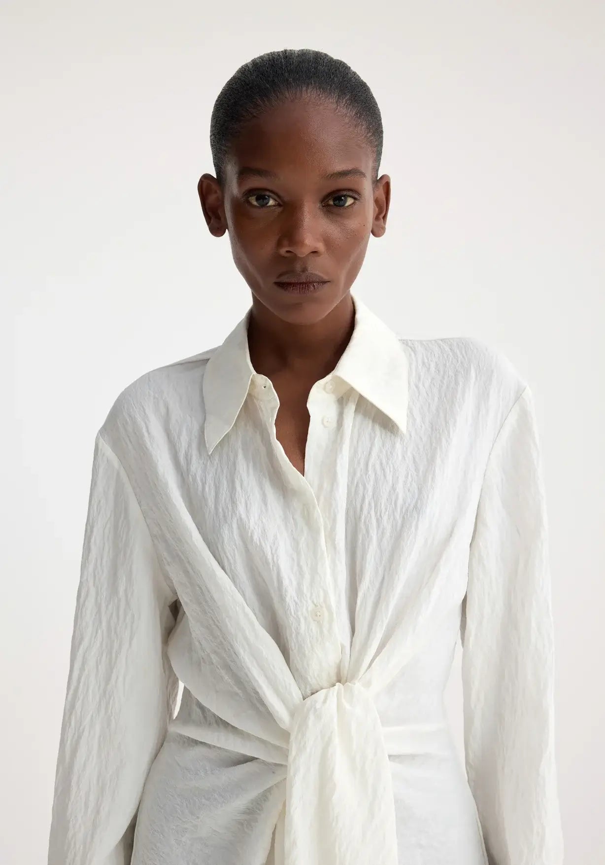 RÓHE HAMMERED SILK KNOTTED SHIRT IN OFF WHITE | THE NEW TREND