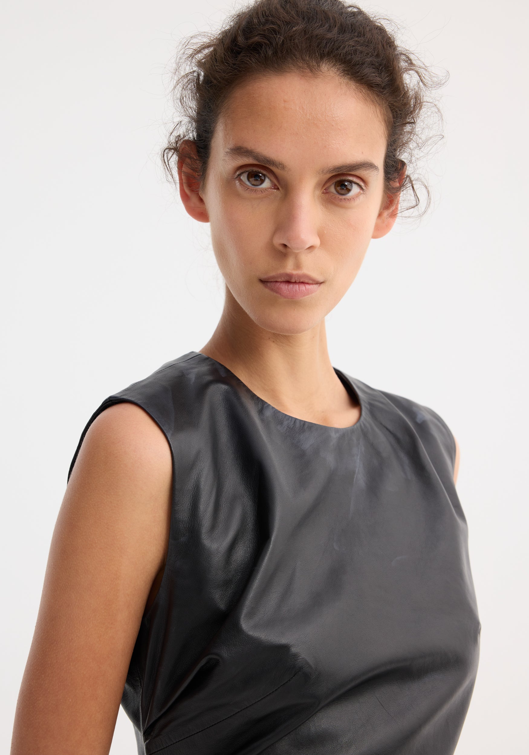 RÓHE SLEEVELESS DRAPED LEATHER TOP | THE NEW TREND