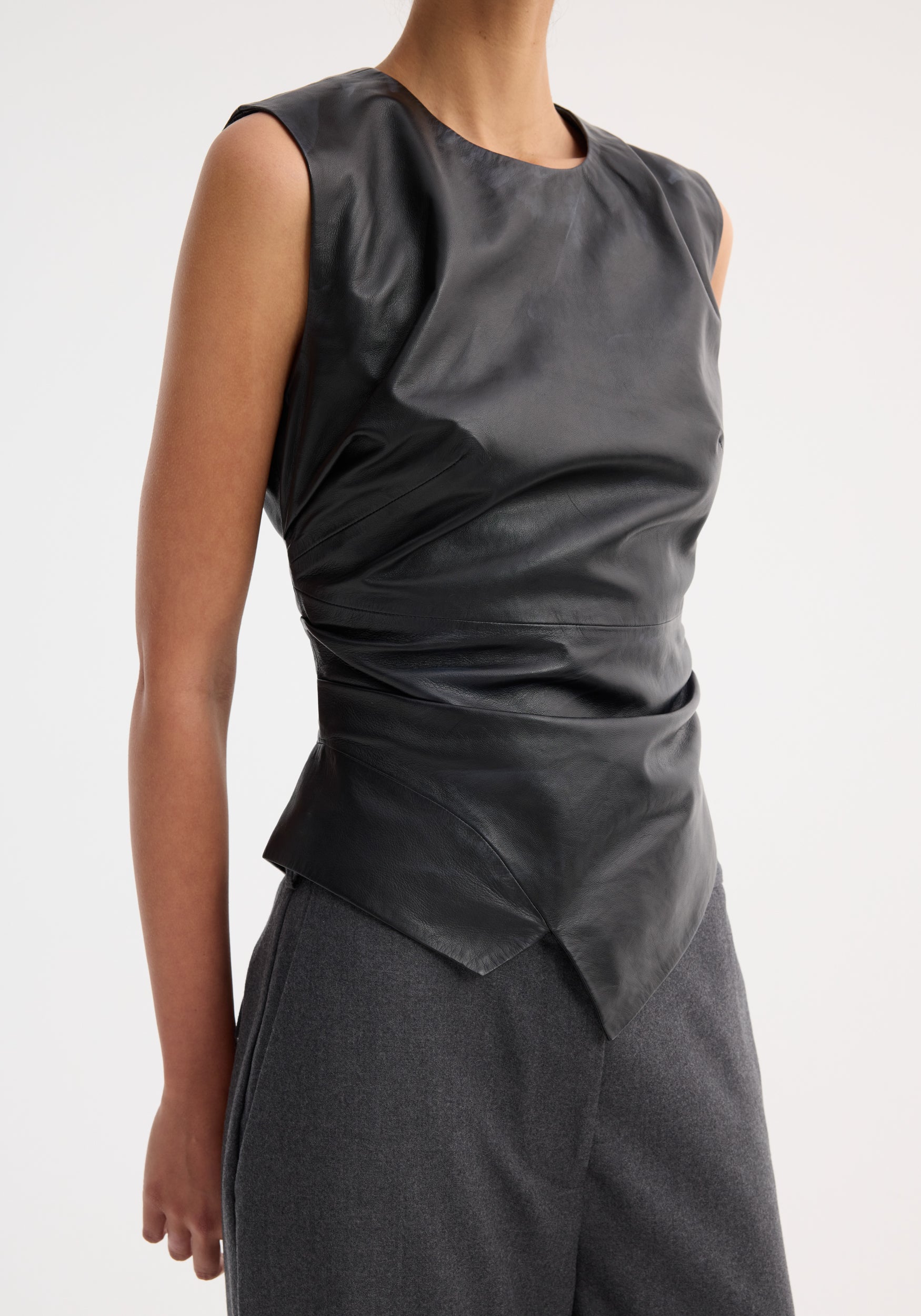 RÓHE SLEEVELESS DRAPED LEATHER TOP | THE NEW TREND