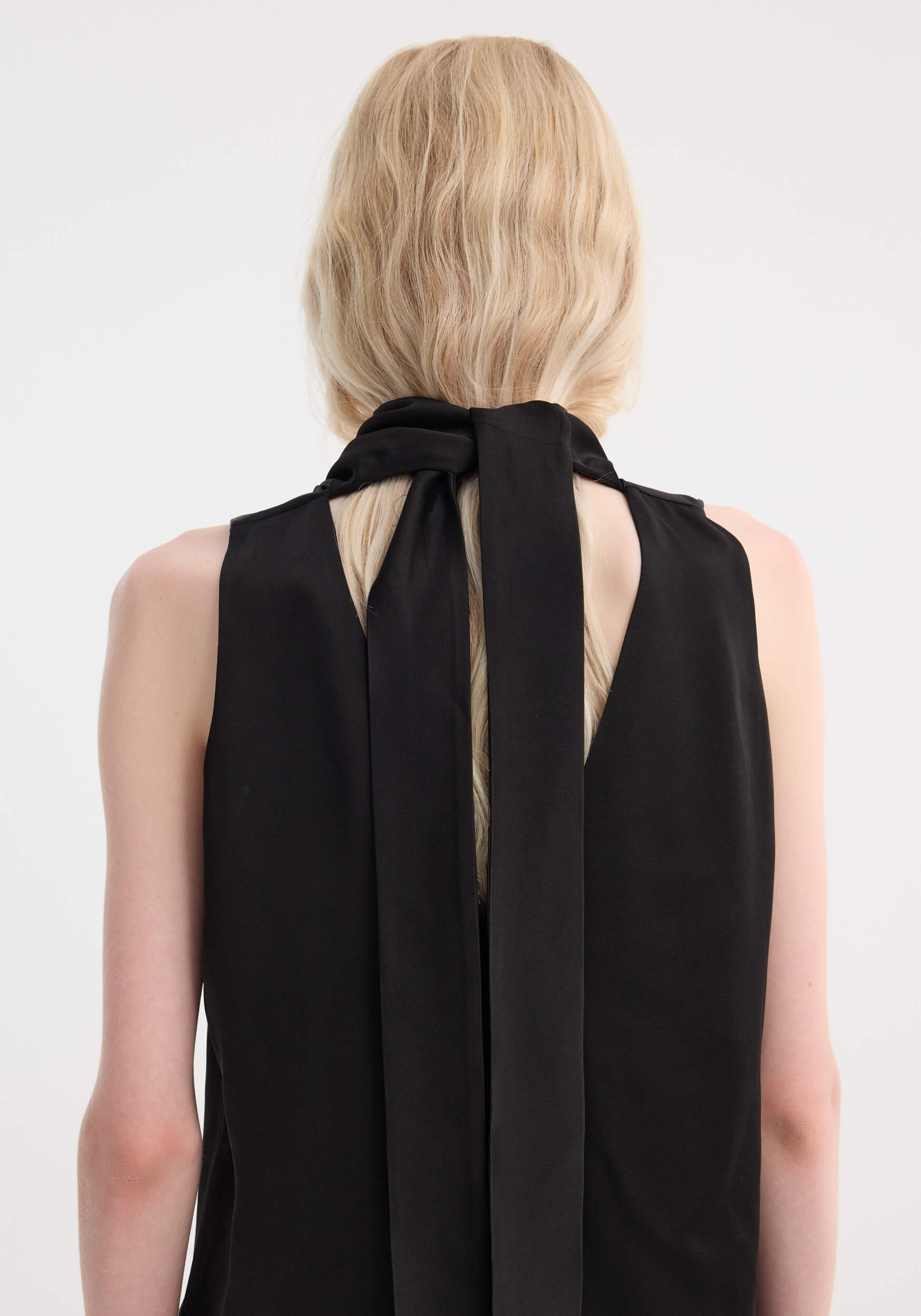 RÓHE SLEEVELESS DRAPED SATIN TOP | THE NEW TREND