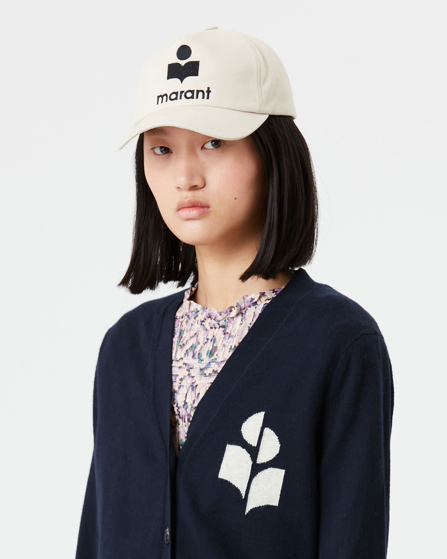 Isabel Marant Tyron Cap in Ecru/Black available at TNT The New Trend Australia. Free shipping on orders over $300 AUD.
